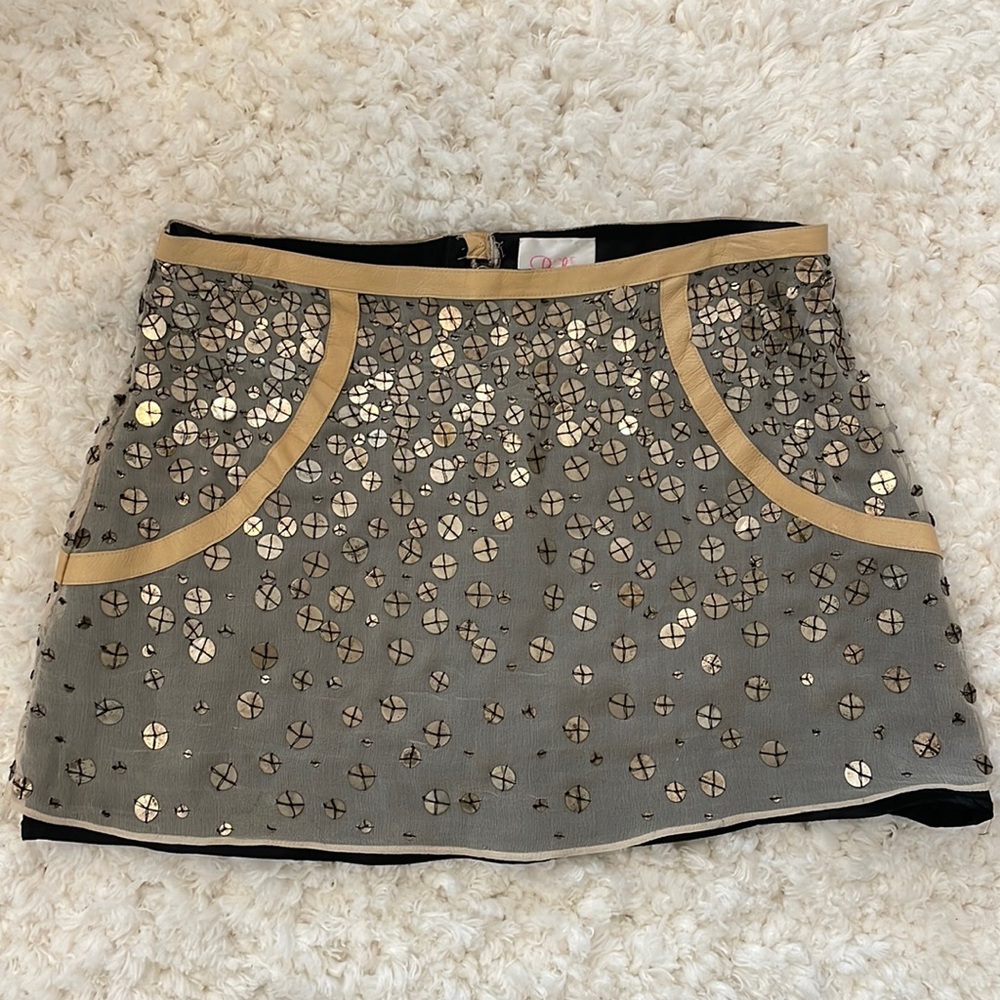 Parker sequin & leather mini skirt fits size 2 US